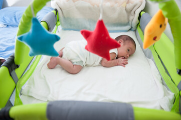 Newborn baby in bed , high quality photo