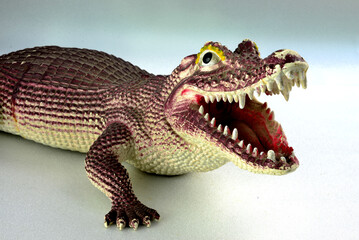 A plastic toy model of a swift crocodile