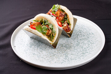 Bao, steamed rice buns, with chicken.