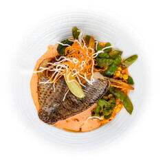 Sea bass fillet, with smoked paprika and WOK vegetables.