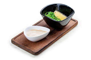 Chuka salad with walnut sauce. Vegetarian dish