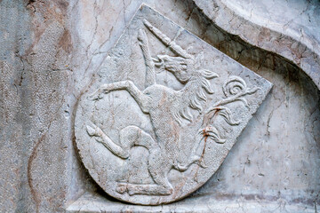 Coat of arms of the czech republic carved out of stone. Stone carving art. Craft.