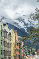 Naklejka premium Innsbruck, Austria - April 16th 2018: Colorful historic facades in the city centre.