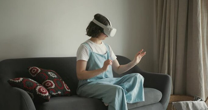 Woman exploring cyberspace with virtual reality headset