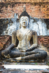 Sukhothai historical park, Buddha statue in Wat Mahathat ruins. One of most beautiful and worth seen place in Thailand. Popular travel destination while visiting southeast Asia.