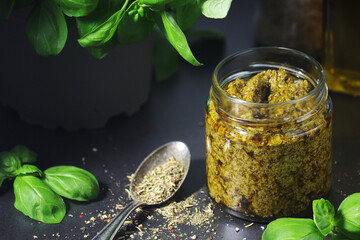Homemade pesto in a glass jar