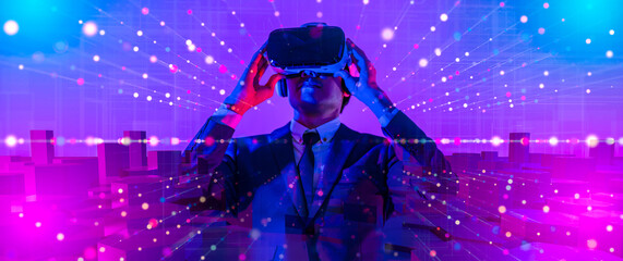 Digital community,Cryptocurrency and entertainment metaverse concept.male having fun play game VR virtual reality goggle in 3D cyberspace futuristic metaverse NFT and virtual reality city background - obrazy, fototapety, plakaty