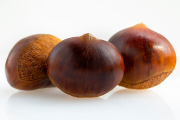 Autumn delicacies, chestnuts, white, white background