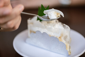 Coconut cake served on a wooden table