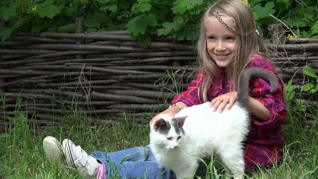 Child Playing with Cat, Kid Plays with Her Kitten Pet, Girl Petting Animal Outdoor in Garden in Yard, Rustic Countryside Children
