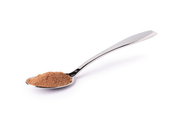 Cocoa powder in stainless steel spoon isolated on white background. Clipping path.