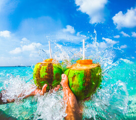 On the beach with coconut drink