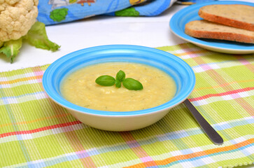 delicious vegetable cauliflower soup in a bowl close up