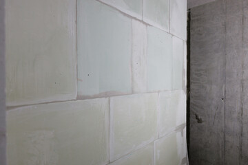 wall made of white gypsum partition blocks, an interior partition.