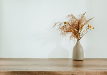 Dried flowers pampas grass in the ceramic vase