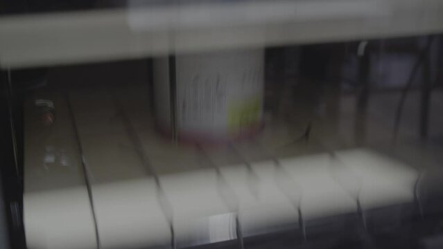 Tinting of paint in vibrating shakers. 