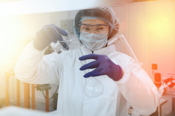 Scientist or nurse holding a test tube