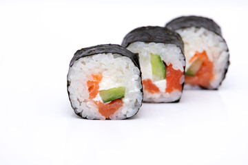 Sushi roll with salmon isolated on a white background