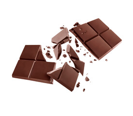 Bar of dark chocolate broken into two halves in the air