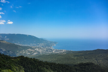 Picturesque view of the city of Yalta and the Black Sea from Ai Petri mountain in the Crimea. Russia.