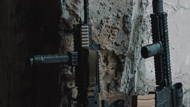 Specialistic army automatic rifles with accessories mounted to Rail Interface System RIS standard rails scopes and magazines. High quality 4k footage
