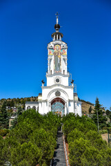 Fototapeta premium Orthodox Church of St. Nicholas the Wonderworker against the blue sky on the southern coast of Crimea. Russia.