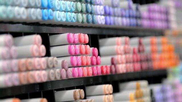 Showcase with multi-colored markers in an art store