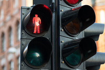 Close-up of a red color at a traffic light at a pedestrian crossing.