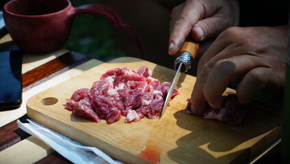 chef preparing meat