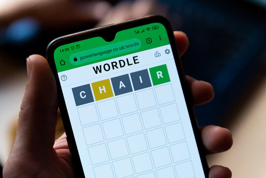 A man plays with the word game Wordle seen in a close up on a mobile phone screen on the official app website in Barcelona, Spain - 9 February 2022.
