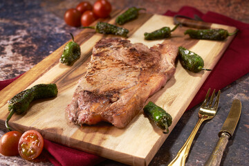 steak with peppers and cherry tomato