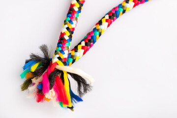 Fototapeta premium Textile accessory or colored threads drawn on a white background. colored knitting yarn