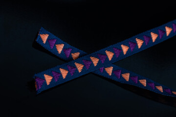 textile accessory or fabric drawn on a black background