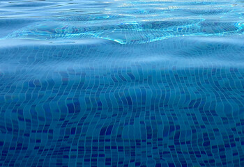 Pool water, blue glass tiles at pool bottom, sunlight reflection, wallpaper background