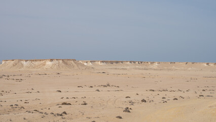 Zekreet desert natural landscape with rocks. rocks are formed into different shapes due to erosion.