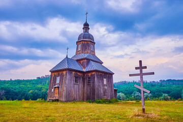 Preserved wooden St Nicholas Church in historical Cossack Village Scansen in Stetsivka village,...