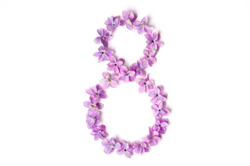 Flowers in the shape of the number 8 on white background. Flat lay, top view, copy space. International Women's Day