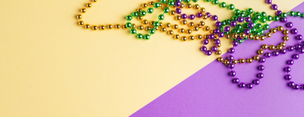 Mardi gras carnivale green, purple, yellow beads