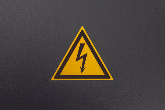 Electric shock hazard sign on the electrical panel door