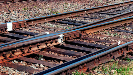 Fototapeta premium Old railway track close up, railway transportation