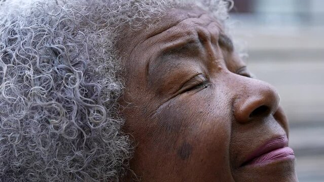 A spiritual older woman eyes in meditation and contemplation