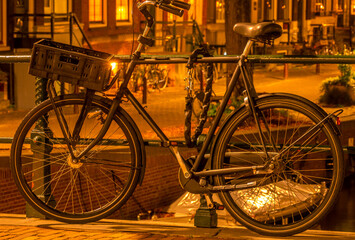 Parked Bicycle in Amsterdam at Night