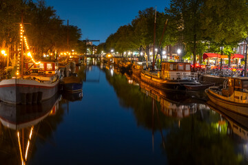 Cloudless Night on the Amsterdam Canal with Boats