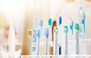 Nozzles for electric toothbrushes