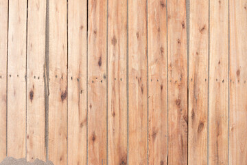 Fototapeta na wymiar Background of wooden slats arranged vertically