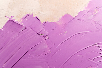 Lilac paint texture on the wall. Rough strokes of the master