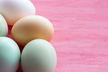 Easter eggs on a pink background. Blank for copy space.