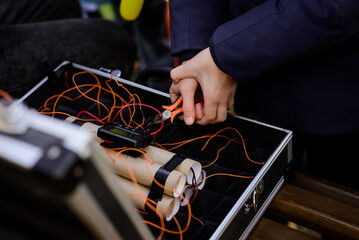 Child play in bomb disposal, explosives. Hand nippers defused the bomb.