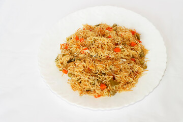 Vegetable Vermicelli Upma Or Semiya Upma In Plate. Isolate White Background
