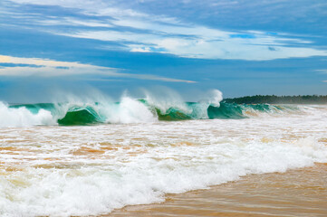 Tropical ocean with high waves.